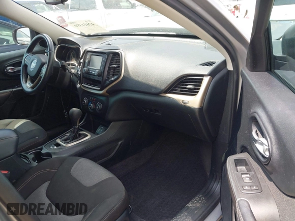 2016 Jeep Cherokee Altitude with VIN 1C4PJLAB7GW307900, listed as a IAAI auction lot 42611390 with 130,123 mi miles and . Bid and sale history available at DreamBid. Image 5.