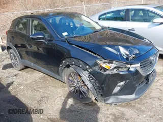 2017 Mazda CX-3 Touring with VIN JM1DKFC70H0171771, listed as a IAAI auction lot 41870395 with 100,472 mi miles. Bid and sale history available at carsss.com. Image 1.