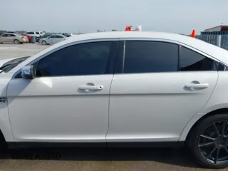 2015 Ford Taurus Limited z VIN 1FAHP2F83FG182936, wystawiony jako IAAI lot #42255917 z przebiegiem 138 966 mil mil oraz . Historia ofert i sprzedaży dostępna na DreamBid. Obrazek 15.