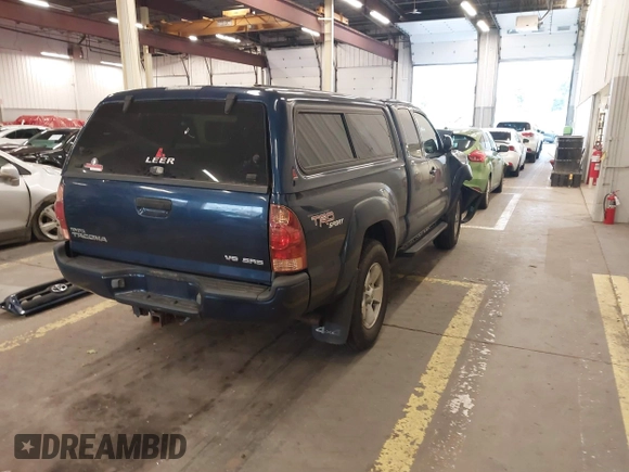 2006 Toyota Tacoma with VIN 5TEUU42N06Z265256, listed as a IAAI auction lot 41371660 with 153,557 mi miles. Bid and sale history available at carsss.com. Image 4.