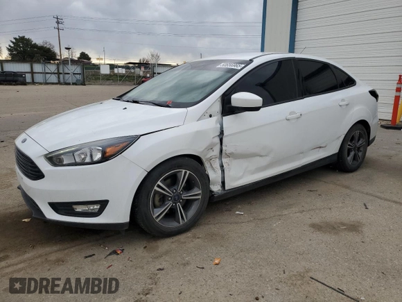2018 Ford Focus SE with VIN 1FADP3FE5JL230334, listed as a Copart auction lot 50656965 with 91,272 mi miles and Salvage Title. Bid and sale history available at carsss.com. Image 1.
