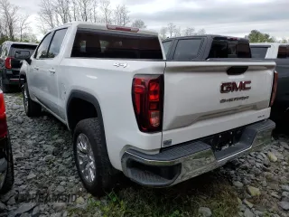 2023 GMC Sierra 1500 with VIN 1GTUUBE84PZ327510, listed as a Copart auction lot 51716385 with 30,590 mi miles and Salvage Title. Bid and sale history available at DreamBid. Image 2.