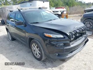 2015 Jeep Cherokee Latitude with VIN 1C4PJLCS4FW631303, listed as a IAAI auction lot 41652246 with 111,942 mi miles. Bid and sale history available at carsss.com. Image 1.