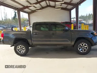 2017 Toyota Tacoma SR5 with VIN 3TMCZ5AN4HM088974, listed as a IAAI auction lot 42047358 with 153,743 mi miles and . Bid and sale history available at DreamBid. Image 14.
