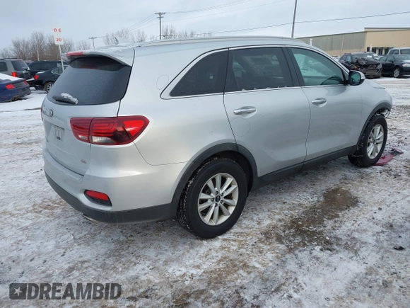 2019 Kia Sorento L with VIN 5XYPG4A31KG547981, listed as a IAAI auction lot 41253059 with 97,104 mi miles. Bid and sale history available at carsss.com. Image 4.