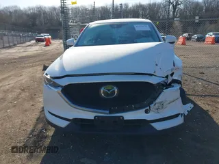 2017 Mazda CX-5 Touring with VIN JM3KFBCL4H0125501, listed as a IAAI auction lot 41979179 with 109,926 mi miles. Bid and sale history available at carsss.com. Image 13.