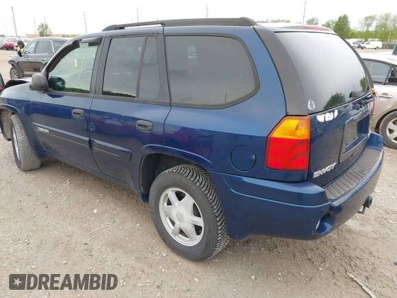 2003 GMC Envoy SLT z VIN 1GKDS13S532309264, wystawiony jako IAAI lot #42200597 z przebiegiem 86 728 mil mil oraz . Historia ofert i sprzedaży dostępna na DreamBid. Obrazek 3.