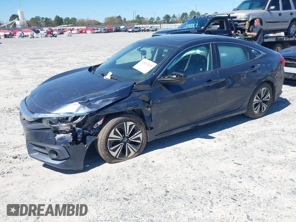 2016 Honda Civic EX-L with VIN 19XFC1F72GE044319, listed as a IAAI auction lot 41823220 with 129,868 mi miles and . Bid and sale history available at DreamBid. Image 2.