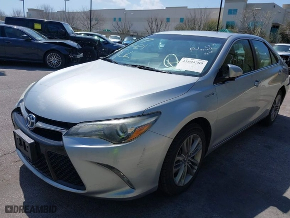 2016 Toyota Camry Hybrid LE with VIN 4T1BD1FKXGU196930, listed as a IAAI auction lot 41694789 with 89,149 mi miles. Bid and sale history available at carsss.com. Image 2.