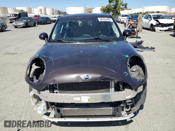 2015 MINI Hardtop 4 Door z VIN WMWXS5C57FT829133, wystawiony jako Copart lot #58764405 z przebiegiem 63 774 mil mil oraz Szkoda całkowita • Salvage title. Historia ofert i sprzedaży dostępna na DreamBid. Obrazek 5.