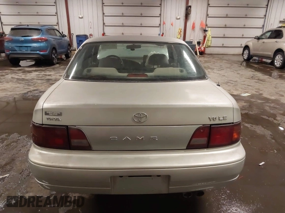 1995 Toyota Camry LE with VIN 4T1GK12E5SU080734, listed as a IAAI auction lot 41738102 with 211,559 mi miles. Bid and sale history available at carsss.com. Image 17.