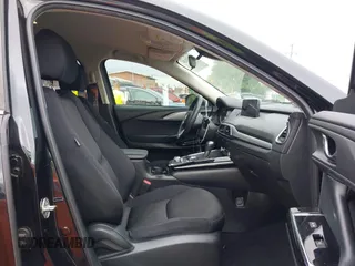 2021 Mazda CX-9 Sport with VIN JM3TCABY6M0522352, listed as a IAAI auction lot 42613136 with 106,167 mi miles and . Bid and sale history available at DreamBid. Image 5.