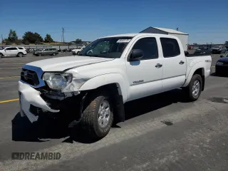 2014 Toyota Tacoma with VIN 3TMLU4EN7EM154562, listed as a Copart auction lot 58658175 with 193,548 mi miles and Salvage title. Bid and sale history available at DreamBid. Image 1.
