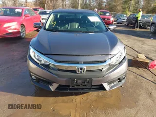 2017 Honda Civic Sedan EX-L with VIN 2HGFC1F70HH633263, listed as a IAAI auction lot 41511642 with 65,769 mi miles. Bid and sale history available at carsss.com. Image 12.