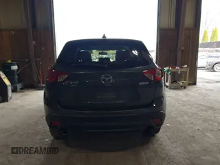2015 Mazda CX-5 Touring with VIN JM3KE4CY6F0510002, listed as a IAAI auction lot 42045284 with 88,949 mi miles and . Bid and sale history available at DreamBid. Image 17.