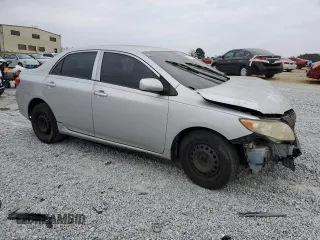 2009 Toyota Corolla with VIN JTDBL40E79J049125, listed as a Copart auction lot 79130204 with 203,856 mi miles and Salvage Title. Bid and sale history available at carsss.com. Image 4.