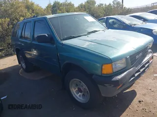 1995 Isuzu Rodeo LS z VIN 4S2CY58V6S4316697, wystawiony jako IAAI lot #42103936 z przebiegiem 143 185 mil mil oraz . Historia ofert i sprzedaży dostępna na DreamBid. Obrazek 1.