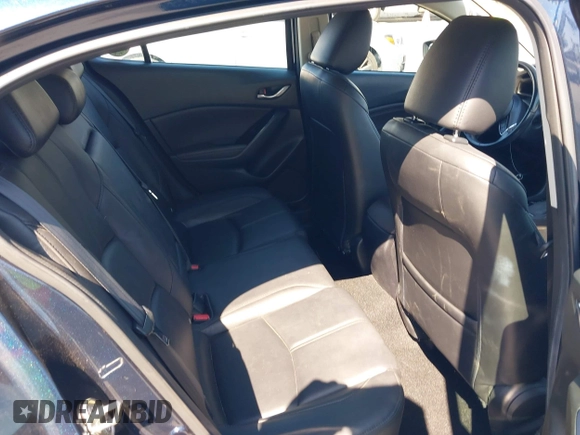 2017 Mazda 3 Touring with VIN 3MZBN1L77HM140562, listed as a IAAI auction lot 42761296 with 76,987 mi miles and . Bid and sale history available at DreamBid. Image 8.