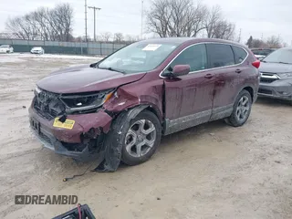 2018 Honda CR-V EX-L z VIN 2HKRW2H87JH698848, wystawiony jako IAAI lot #41624159 z przebiegiem 62 198 mil mil oraz . Historia ofert i sprzedaży dostępna na DreamBid. Obrazek 2.