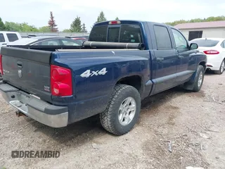 2006 Dodge Dakota SLT z VIN 1D7HW48J66S514184, wystawiony jako IAAI lot #42270964 z przebiegiem 105 857 mil mil oraz . Historia ofert i sprzedaży dostępna na DreamBid. Obrazek 4.