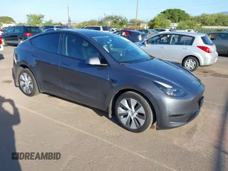 2023 Tesla Model Y Long Range with VIN 7SAYGDEE0PF928836, listed as a IAAI auction lot 41538742 with 9,630 mi miles and . Bid and sale history available at DreamBid. Image 1.