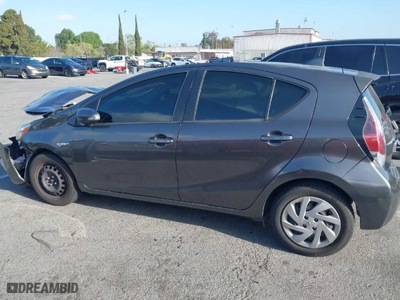 2015 Toyota Prius c One with VIN JTDKDTB33F1585004, listed as a IAAI auction lot 41950129 with 209,233 mi miles. Bid and sale history available at carsss.com. Image 14.