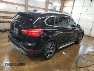 2017 BMW X1 xDrive28i with VIN WBXHT3C34H5F87048, listed as a Copart auction lot 67545012 with 76,666 mi miles. Bid and sale history available at carsss.com. Image 3.