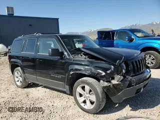 2014 Jeep Patriot Latitude with VIN 1C4NJRFB5ED855888, listed as a Copart auction lot 57969355 with 113,196 mi miles and Salvage title. Bid and sale history available at DreamBid. Image 13.