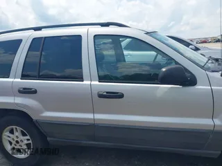 2004 Jeep Grand Cherokee Laredo with VIN 1J4GX48N04C435603, listed as a IAAI auction lot 42274197 with 256,163 mi miles and . Bid and sale history available at DreamBid. Image 13.
