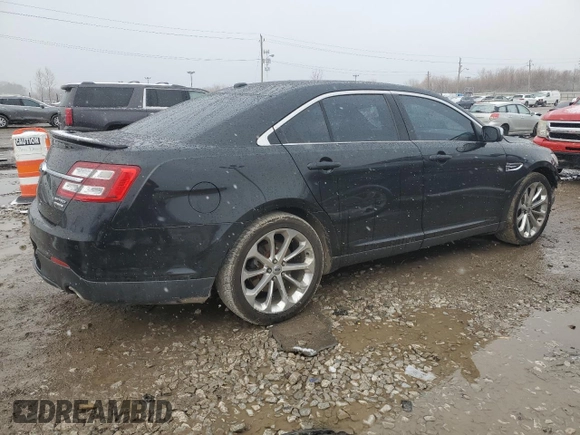 2013 Ford Taurus Limited z VIN 1FAHP2F80DG216618, wystawiony jako Copart lot #85572994 z przebiegiem 185 697 mil mil oraz Szkoda całkowita • Salvage title. Historia ofert i sprzedaży dostępna na DreamBid. Obrazek 3.