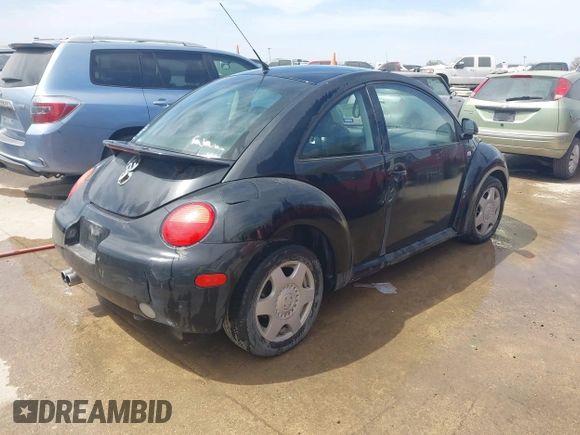 1999 Volkswagen Beetle GLS z VIN 3VWCA21C2XM404338, wystawiony jako IAAI lot #41606143 z przebiegiem 192 205 mil mil oraz . Historia ofert i sprzedaży dostępna na DreamBid. Obrazek 4.