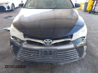 2015 Toyota Camry XLE with VIN 4T1BF1FK9FU965992, listed as a IAAI auction lot 42136728 with 147,209 mi miles and . Bid and sale history available at DreamBid. Image 6.