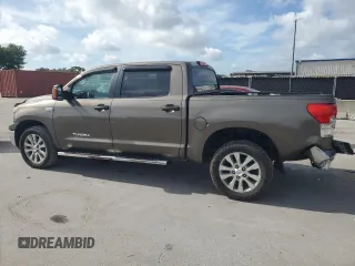 2012 Toyota Tundra z VIN 5TFDW5F14CX216264, wystawiony jako Copart lot #60983285 z przebiegiem 186 869 mil mil oraz Szkoda całkowita • Salvage title. Historia ofert i sprzedaży dostępna na DreamBid. Obrazek 2.