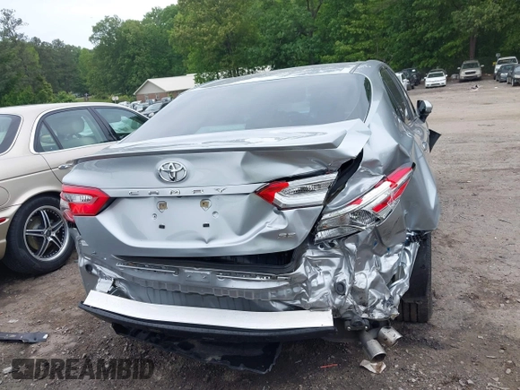 2018 Toyota Camry LE z VIN 4T1B11HK3JU129549, wystawiony jako IAAI lot #42159243 z przebiegiem 76 299 mil mil oraz . Historia ofert i sprzedaży dostępna na DreamBid. Obrazek 17.