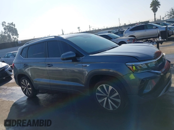 2022 Volkswagen Taos SE z VIN 3VVTX7B2XNM073480, wystawiony jako IAAI lot #41593882 z przebiegiem 93 363 mil mil oraz . Historia ofert i sprzedaży dostępna na DreamBid. Obrazek 13.