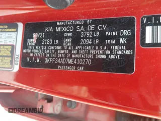 2021 Kia Forte GT-Line z VIN 3KPF34AD7ME410270, wystawiony jako IAAI lot #42259704 z przebiegiem 65 310 mil mil oraz . Historia ofert i sprzedaży dostępna na DreamBid. Obrazek 9.