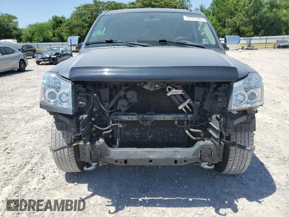 2015 Nissan Titan Pro-4X with VIN 1N6BA0EC5FN514184, listed as a Copart auction lot 56721065 with 127,283 mi miles and Salvage title. Bid and sale history available at DreamBid. Image 5.