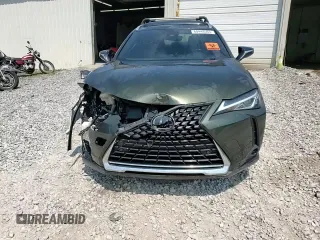 2019 Lexus UX 200 with VIN JTHY3JBH2K2019447, listed as a Copart auction lot 60448565 with 122,586 mi miles and Salvage title. Bid and sale history available at DreamBid. Image 14.