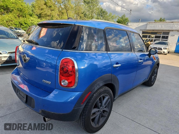2012 MINI Countryman with VIN WMWZB3C50CWM30636, listed as a Copart auction lot 58615615 with 123,289 mi miles and Clean title. Bid and sale history available at DreamBid. Image 4.