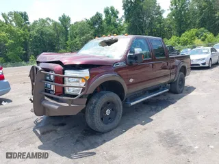 2015 Ford Super Duty F-250 SRW Lariat with VIN 1FT7W2BT6FEA69383, listed as a IAAI auction lot 39604032 with 192,915 mi miles. Bid and sale history available at carsss.com. Image 2.