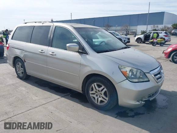 2005 Honda Odyssey EX-L with VIN 5FNRL38675B422980, listed as a IAAI auction lot 41680392 with 188,145 mi miles. Bid and sale history available at carsss.com. Image 1.