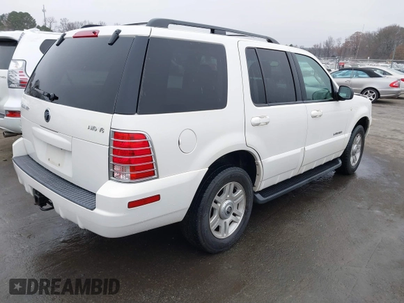 2002 Mercury Mountaineer Convenience z VIN 4M2ZU86W12ZJ35003, wystawiony jako IAAI lot #41193635 z przebiegiem 168 601 mil mil oraz . Historia ofert i sprzedaży dostępna na DreamBid. Obrazek 4.