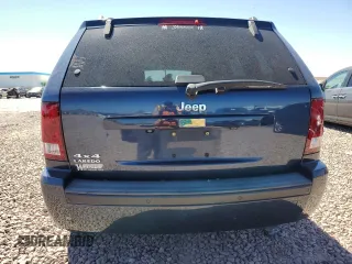 2010 Jeep Grand Cherokee Laredo with VIN 1J4PR4GK9AC104970, listed as a Copart auction lot 72173034 with 120,354 mi miles and Salvage Title. Bid and sale history available at carsss.com. Image 6.