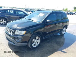 2013 Jeep Compass Sport with VIN 1C4NJCBB5DD103013, listed as a IAAI auction lot 41885936 with 169,402 mi miles. Bid and sale history available at carsss.com. Image 2.