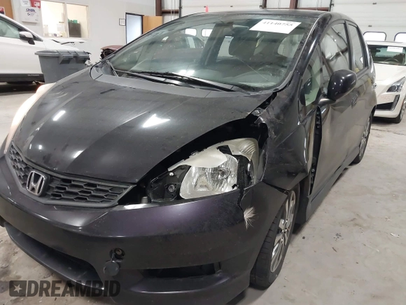 2013 Honda Fit Sport z VIN JHMGE8H56DC019556, wystawiony jako IAAI lot #41140755 z przebiegiem Nie podano mil oraz . Historia ofert i sprzedaży dostępna na DreamBid. Obrazek 6.