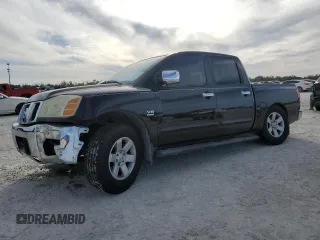 2004 Nissan Titan LE with VIN 1N6AA07A74N516071, listed as a Copart auction lot 87472284 with 140,011 mi miles and Salvage Title. Bid and sale history available at DreamBid. Image 1.