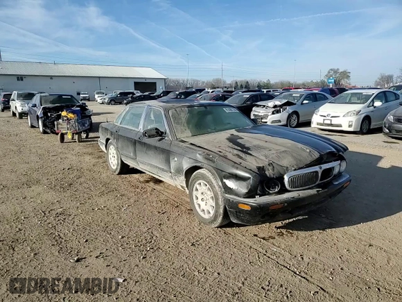 1998 Jaguar XJ with VIN SAJHX1245WC819762, listed as a Copart auction lot 81480174 with 132,491 mi miles and Salvage title. Bid and sale history available at DreamBid. Image 11.