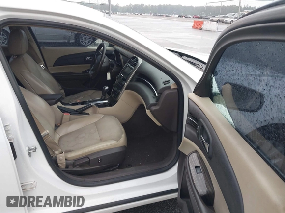2014 Chevrolet Malibu LT with VIN 1G11E5SL6EF142201, listed as a IAAI auction lot 42112527 with 203,349 mi miles and . Bid and sale history available at DreamBid. Image 5.
