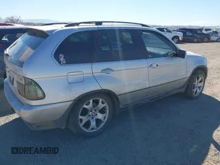 2001 BMW X5 4.4i with VIN WBAFB33581LH23527, listed as a IAAI auction lot 41851365 with 158,858 mi miles. Bid and sale history available at carsss.com. Image 4.