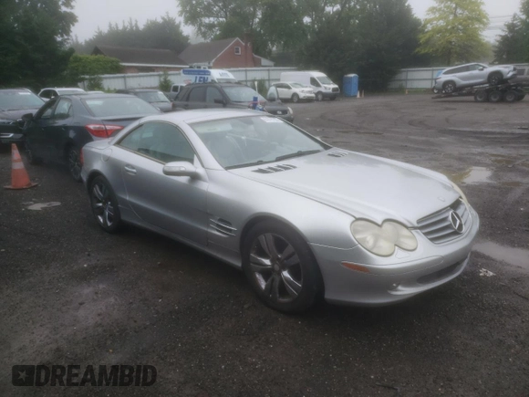 2005 Mercedes-Benz SL 500 with VIN WDBSK75F05F094991, listed as a Copart auction lot 61678705 with 128,123 mi miles and Clean title. Bid and sale history available at DreamBid. Image 4.